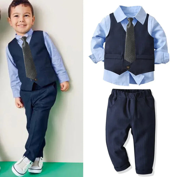 Boys navy blue pant set with light blue long sleeve shirt and vest, includes striped tie for formal wear