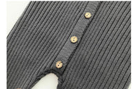 neutral baby romper knit 3-24 months in dark gray with ribbed texture and wooden buttons