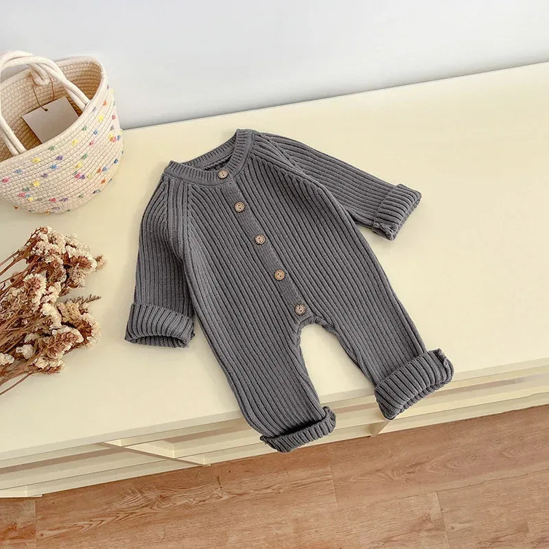 Neutral baby romper knit 3-24 months in gray with button details and long sleeves