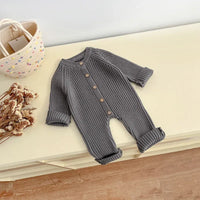 Neutral baby romper knit 3-24 months in gray with button details and long sleeves