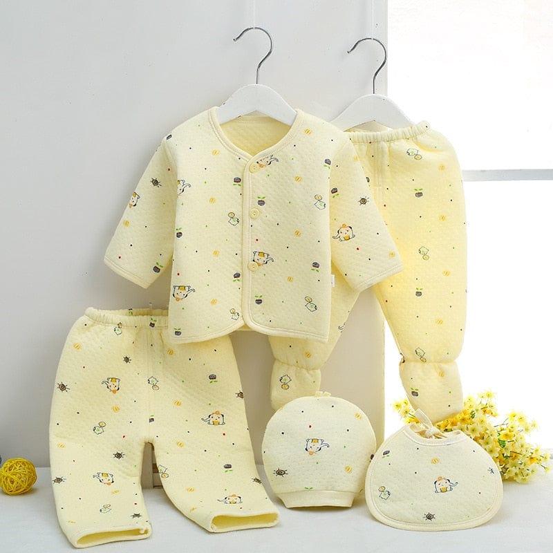 yellow newborn baby layette set with long sleeve jacket, footed pants, pants, hat, and bib for infants
