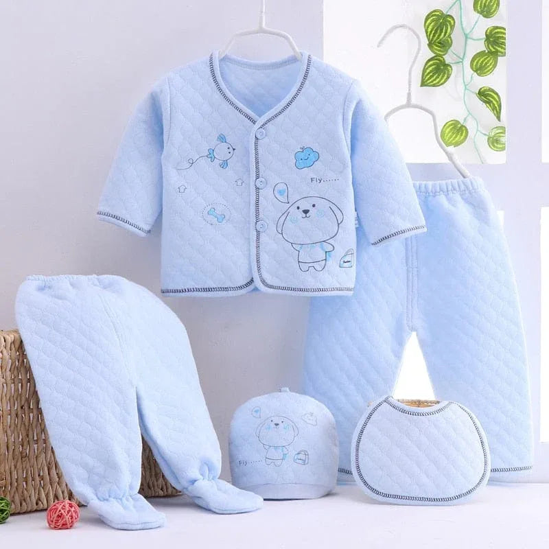 Light blue newborn quilted layette set with long sleeve jacket, pants, hat, and bib for babies