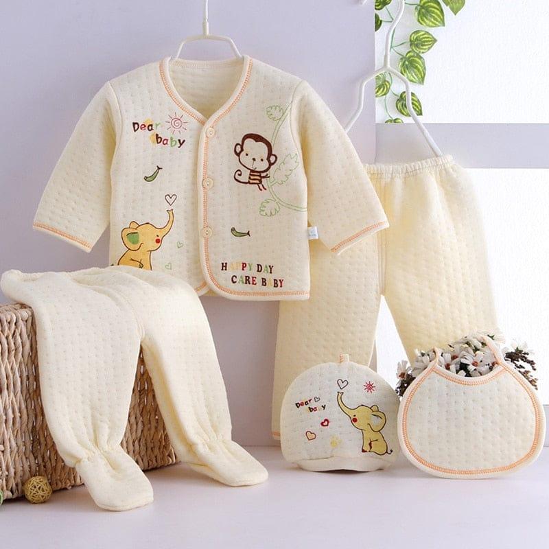 Cream newborn quilted layette set for babies with long sleeve jacket, footed pants, hat, and bib featuring animal embroidery