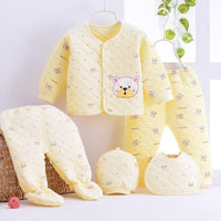 Yellow newborn quilted layette set with bear patch for babies including jacket pants hat bib