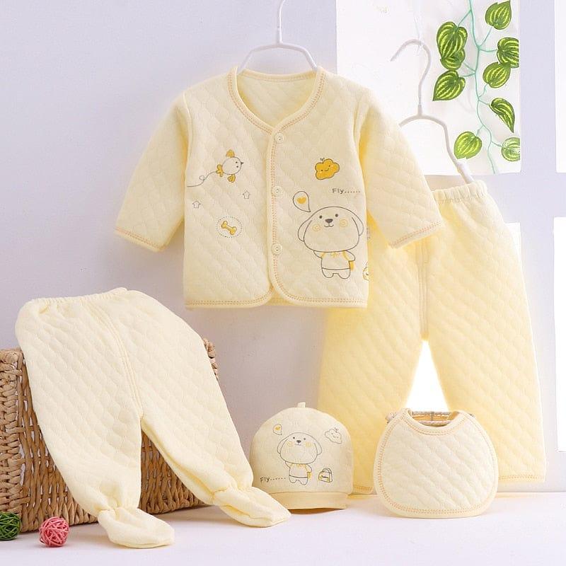 yellow newborn quilted layette set with dog and bone prints including jacket pants hat and bib for babies