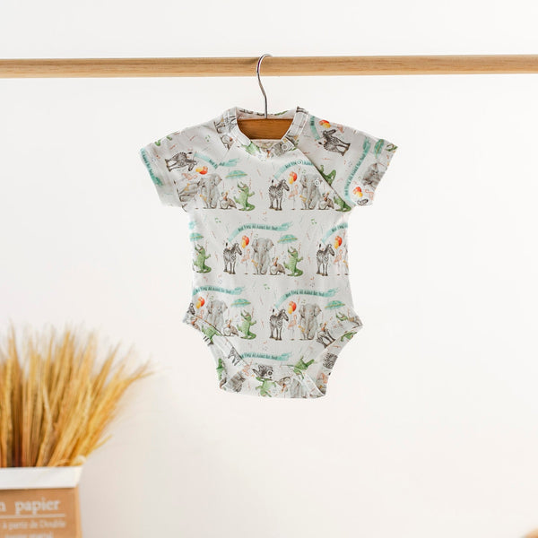 And They All Asked for You organic cotton baby onesie with zoo animal print on white fabric.