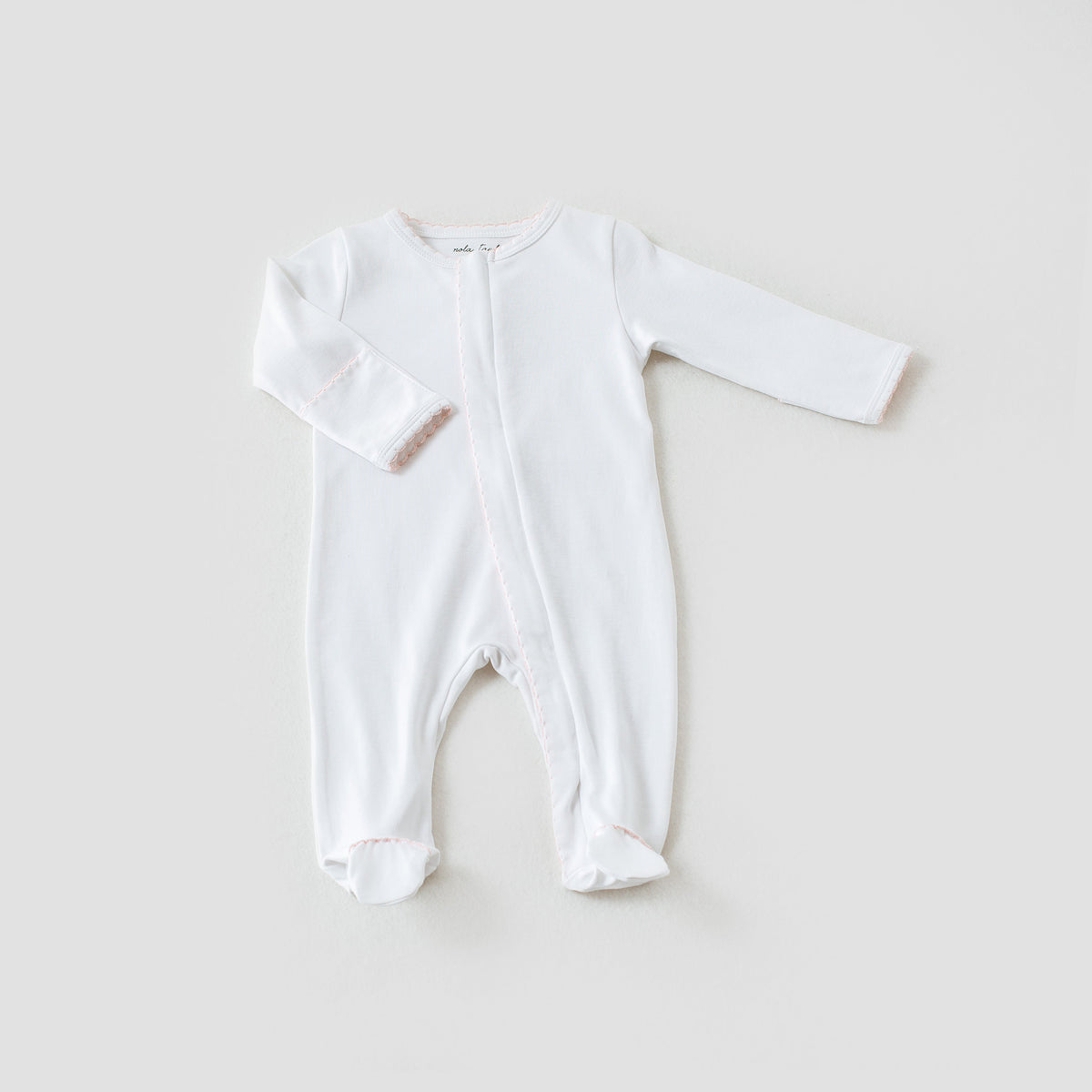 White baby pink newborn Take Me Home gown with long sleeves, footies, and delicate pink trim detailing for elegant新生儿 comfort.