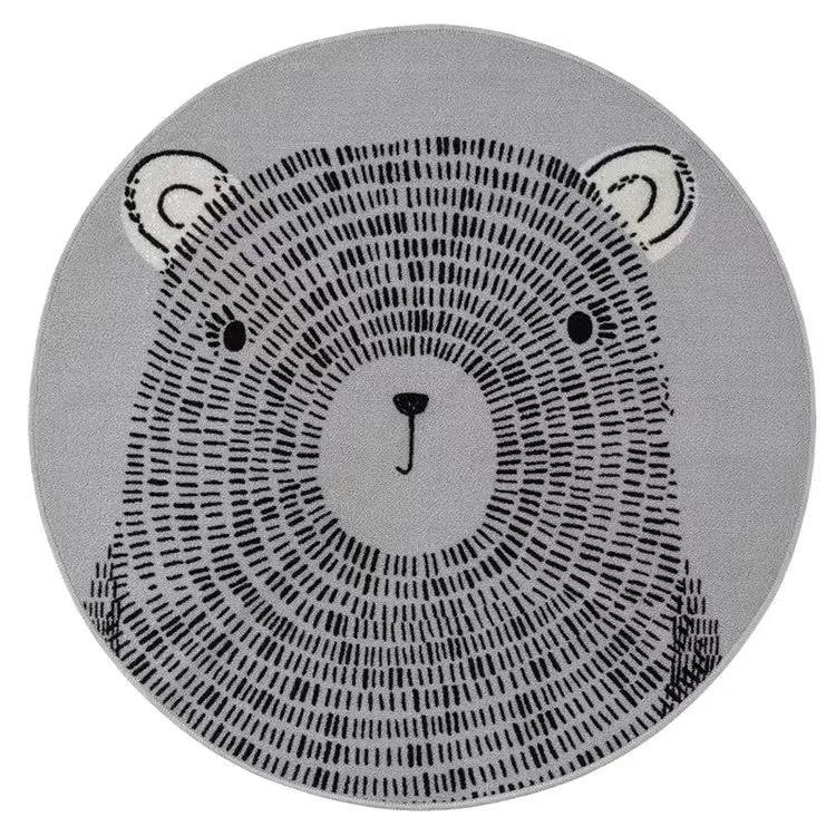 round gray baby nursery rug with black bear face design for infants and toddlers