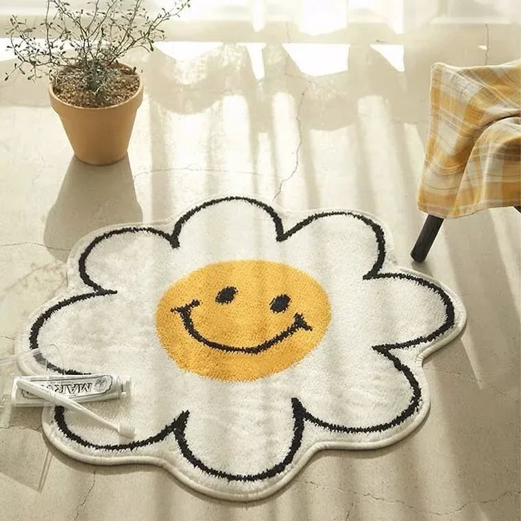 White and yellow baby rug shaped like a smiling flower for nursery rug and toddlers