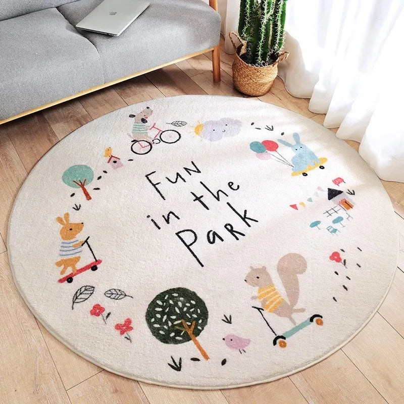 Round white nursery rug for babies and kids with colorful animal designs and Fun in the Park text