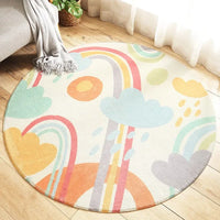 Round pastel nursery rugs with rainbows and clouds design for babies and kids room