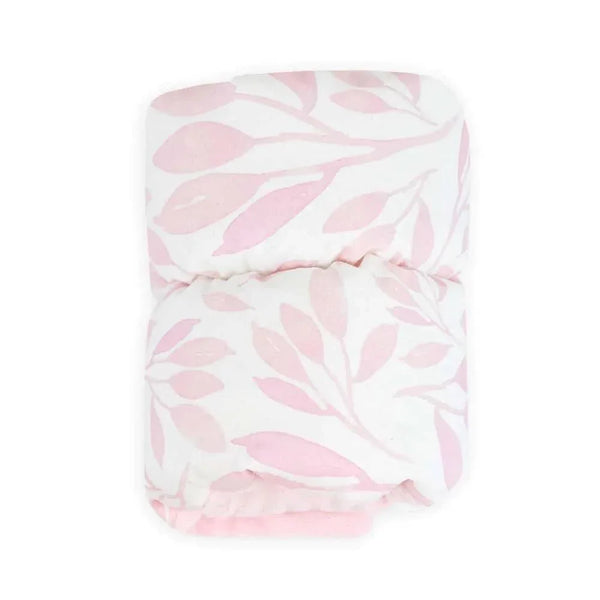 Goosewaddle nursing arm pillow in white with pink leaf pattern for newborns