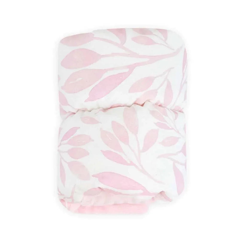 Goosewaddle nursing arm pillow in white with pink leaf pattern for newborns
