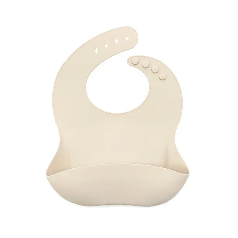 cream silicone waterproof baby bibs with adjustable neck buttons for infants and toddlers