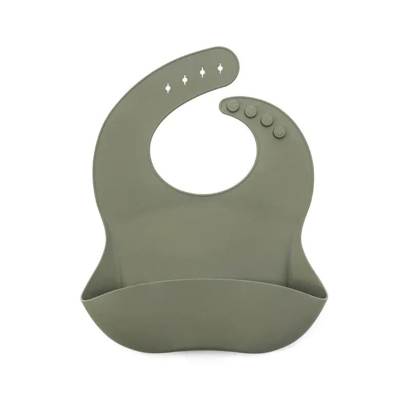olive green waterproof baby bib made of soft silicone with adjustable buttons for infants and toddlers