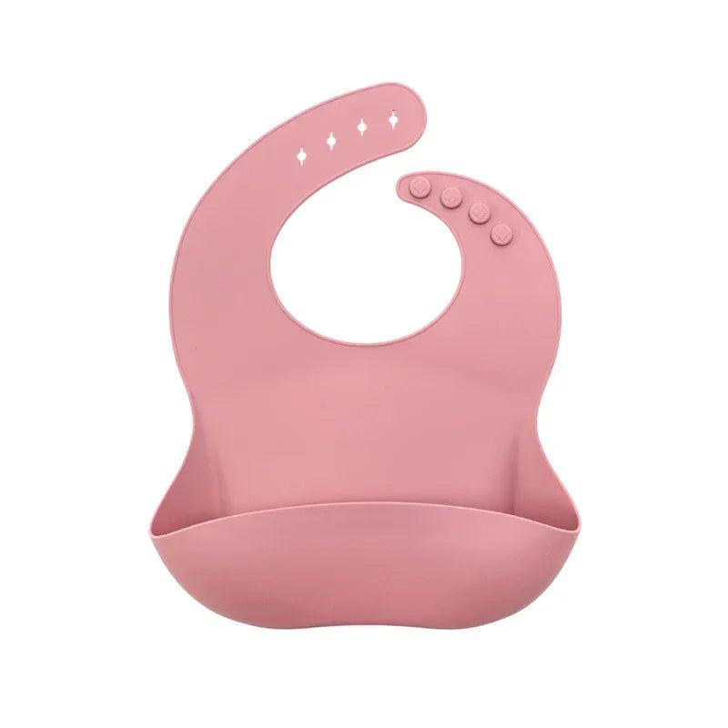 pink waterproof baby bibs with adjustable neck buttons for babies and toddlers