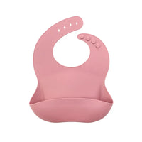 pink waterproof baby bibs with adjustable neck buttons for babies and toddlers