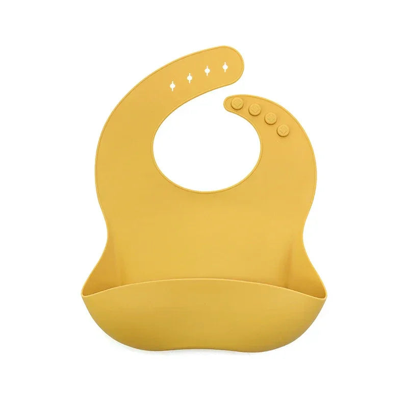 yellow waterproof baby bibs for infants with adjustable neck buttons and food catcher pocket