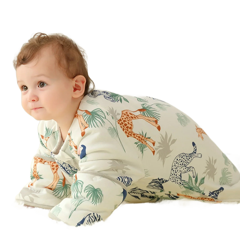 Cozy Baby Sleep Sack With Detachable Sleeves featuring a toddler lounging in a comfy animal-printed sleep sack, emphasizing style and warmth.