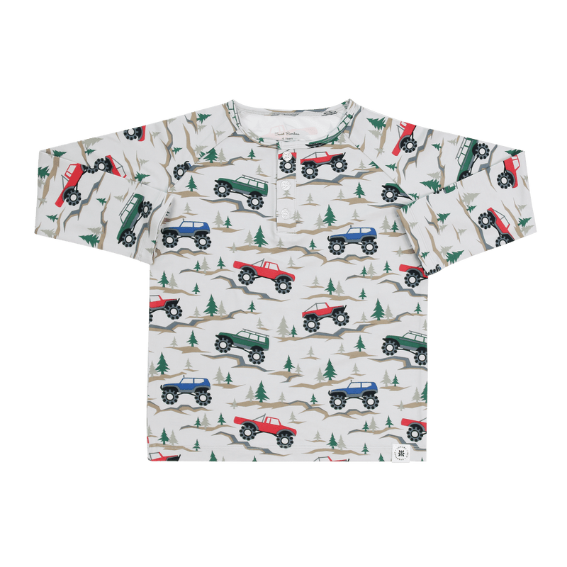 White raglan henley for kids featuring a monster truck and pine tree print with a buttoned front placket for comfort.