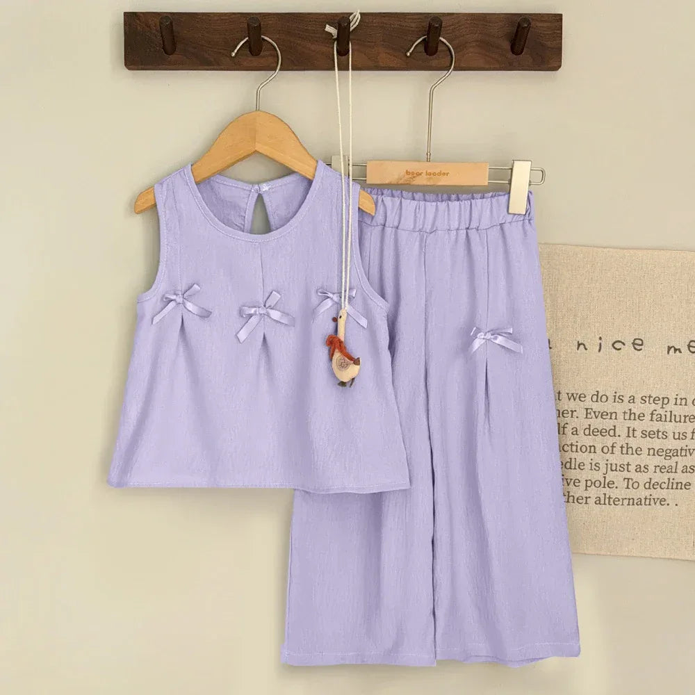 toddler lavender pant set with sleeveless top and bows for girls