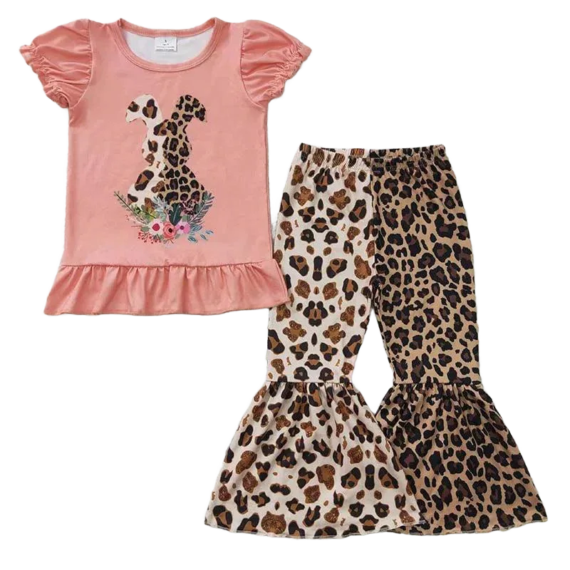 Girls pink pant set with puff sleeves and leopard dog print top and matching leopard print flare pants