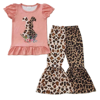 Girls pink pant set with puff sleeves and leopard dog print top and matching leopard print flare pants