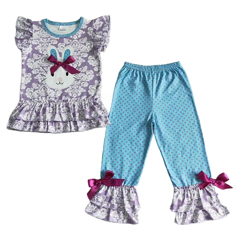 toddler girls pant set with purple ruffle top featuring bunny face and blue polka dot pants with ruffle hems and bows