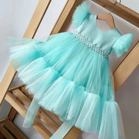 baby blue party dress for girls with tulle skirt and pearl detail on waist