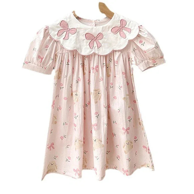 Girls pink party dress with white collar and pink bow details, 2-4 years size