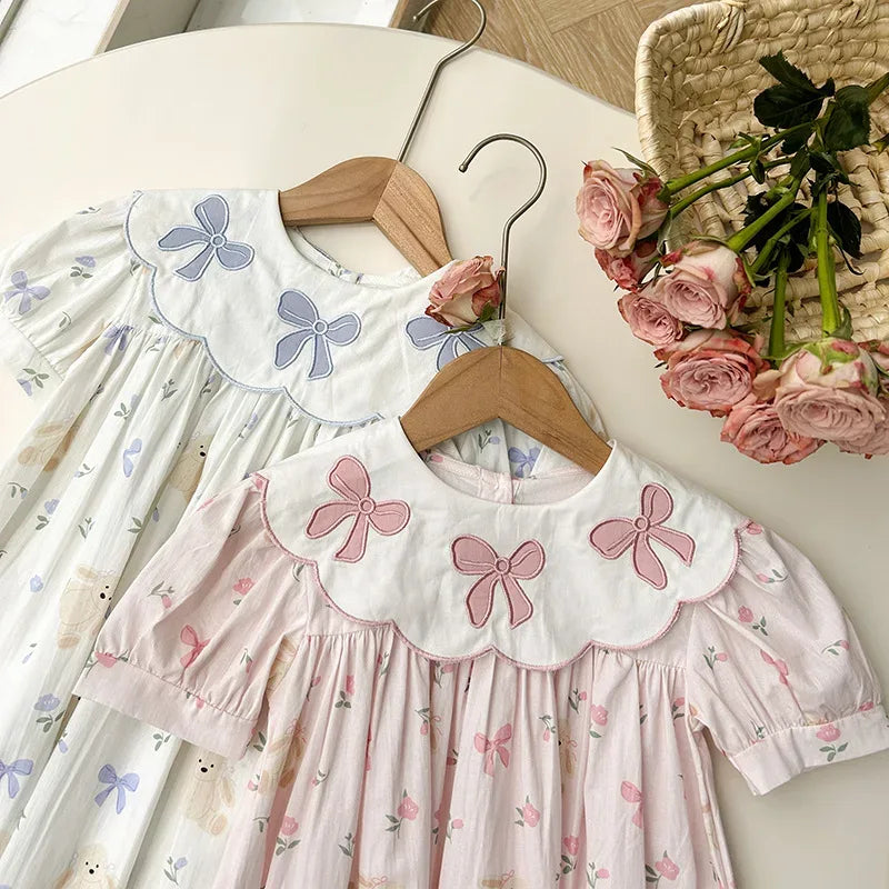 babies pink and white party dress with bow embroidery and puff sleeves size 12-24 months