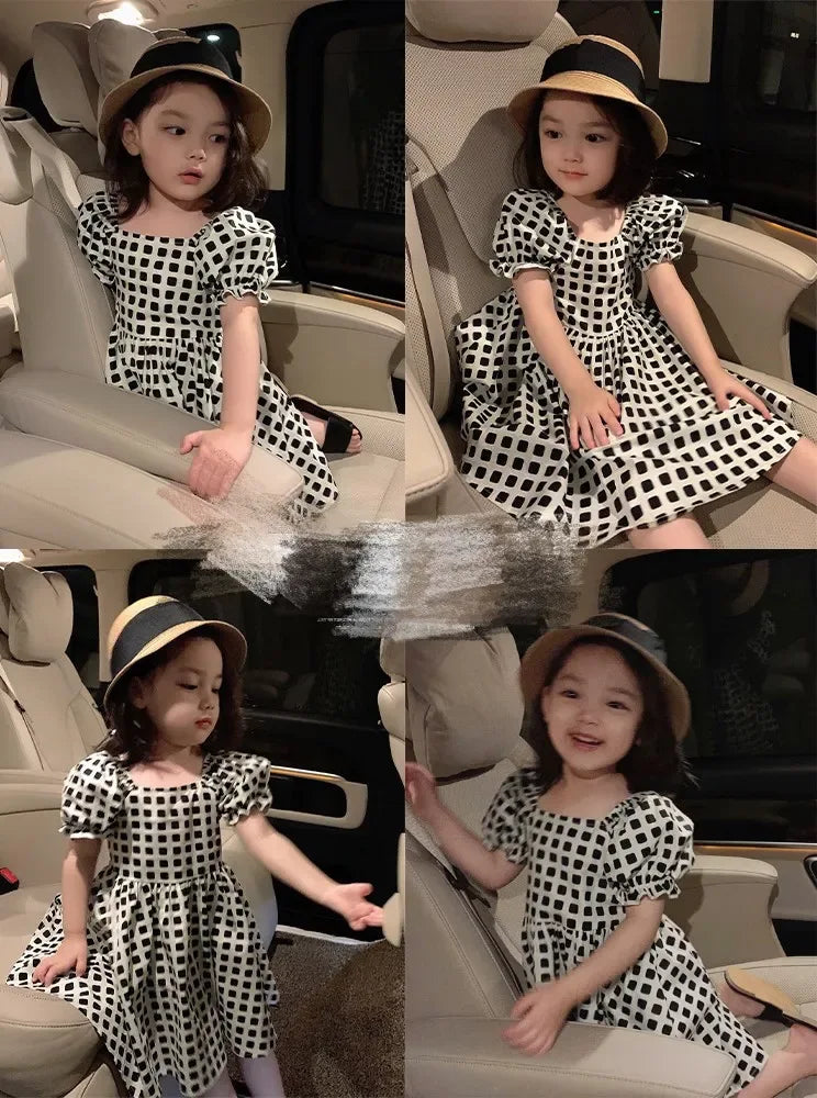 Toddler girls black and white checkered party dress with puff sleeves, age 2-3 years