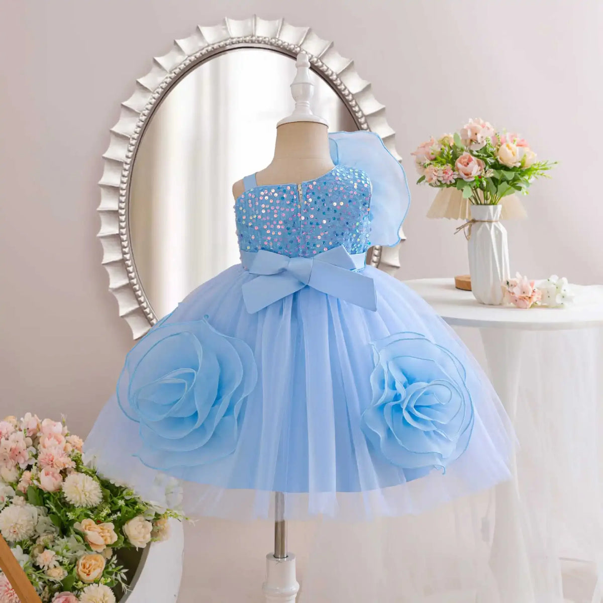 baby blue party dress with sequined bodice and large flower details for toddlers