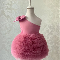 baby pink party dress with one shoulder and fluffy tulle skirt for infants and toddlers