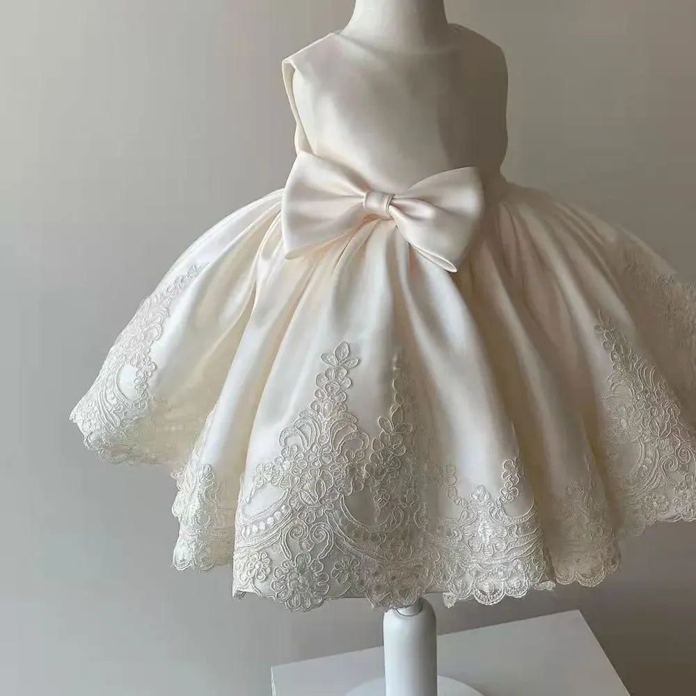 Ivory baby party dress with bow and lace embroidery for infants and toddlers