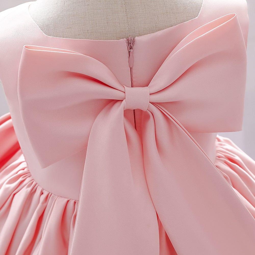 baby pink party dress with large bow detail on back for infants and toddlers
