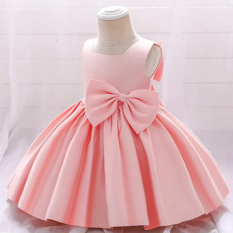baby pink party dress with large bow detail sleeveless for toddlers
