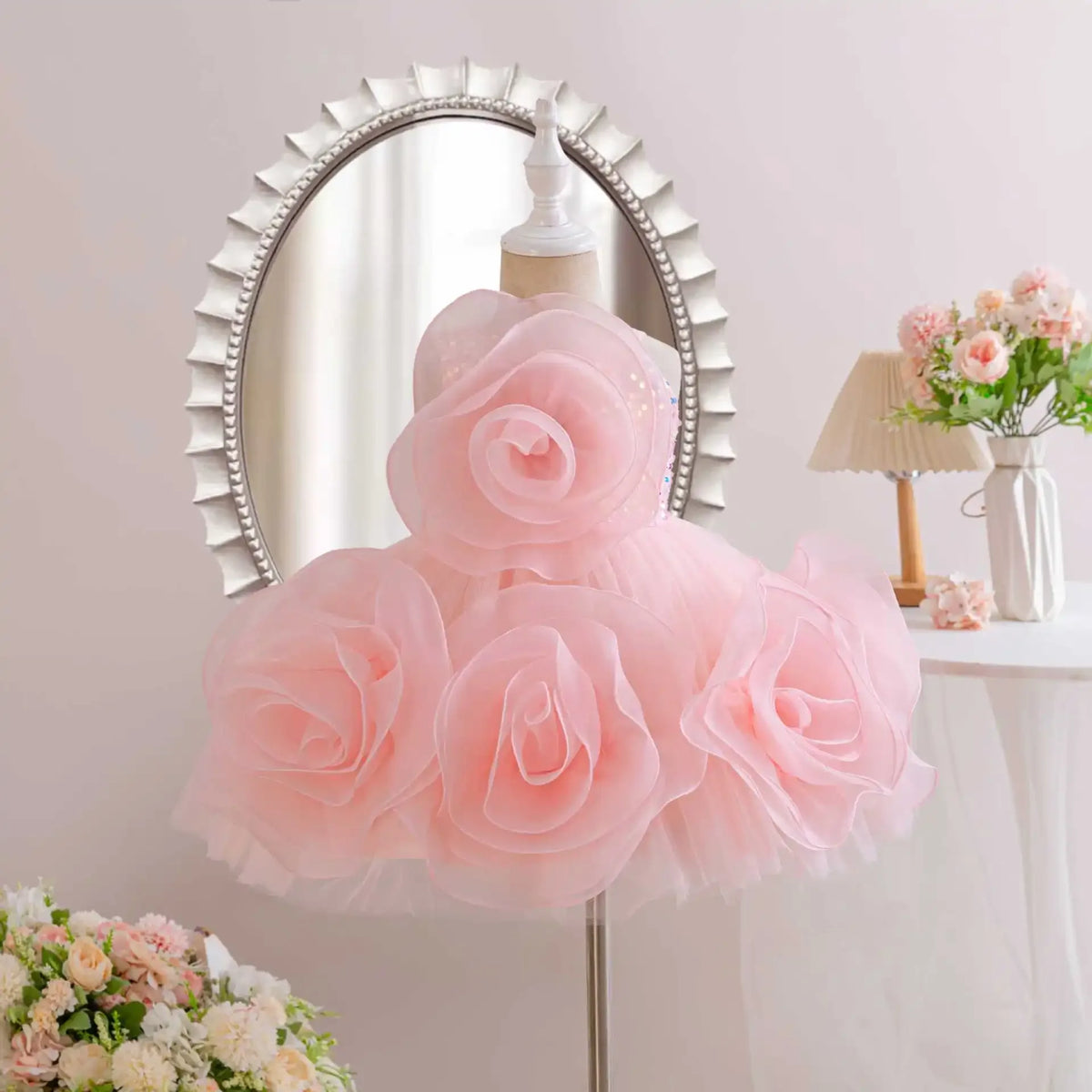 baby pink party dress with large floral tulle appliques and sleeveless design
