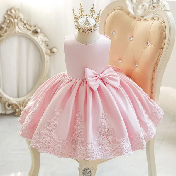 baby pink party dress with bow and lace hem for infants