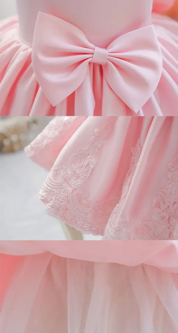 baby girls pink party dress with large bow and lace trim for infants and toddlers