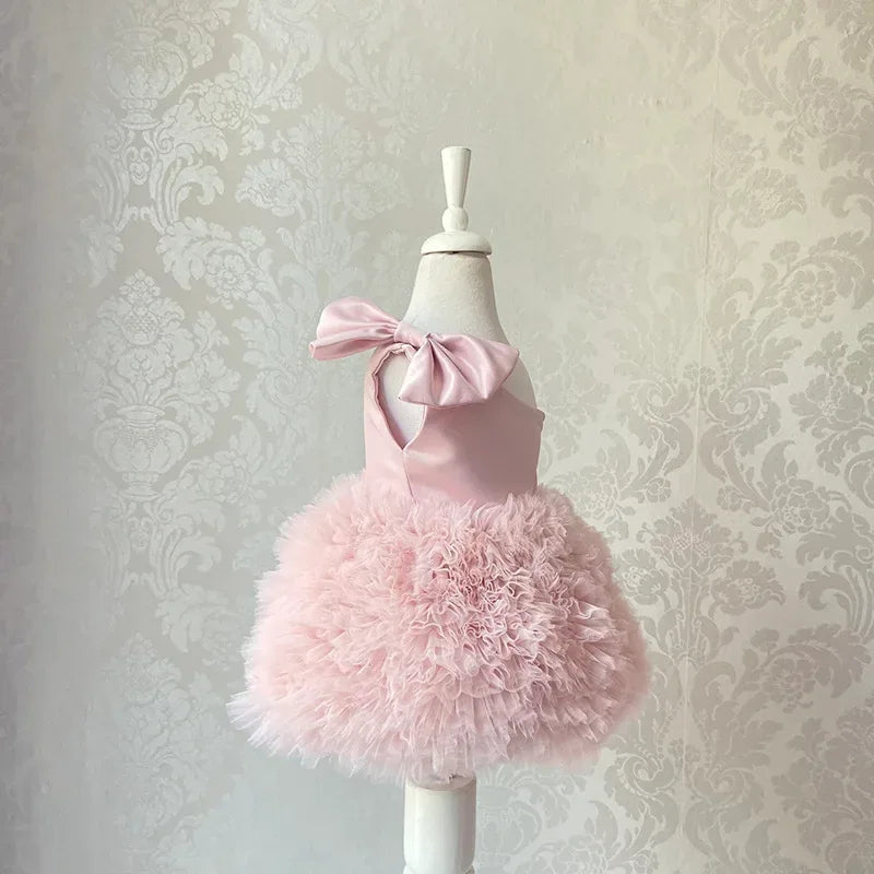 pink baby party dress with large bow and fluffy tulle skirt for infants