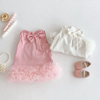 Pink and white baby party dress with bow detail and ruffled hem for infant girls