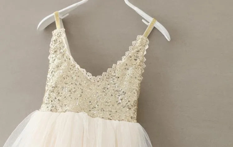 Girls cream party dress with sequin bodice and tulle skirt for toddlers and kids