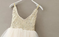 Girls cream party dress with sequin bodice and tulle skirt for toddlers and kids
