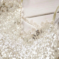 cream sequin party dress for babies with lace trim and gold straps