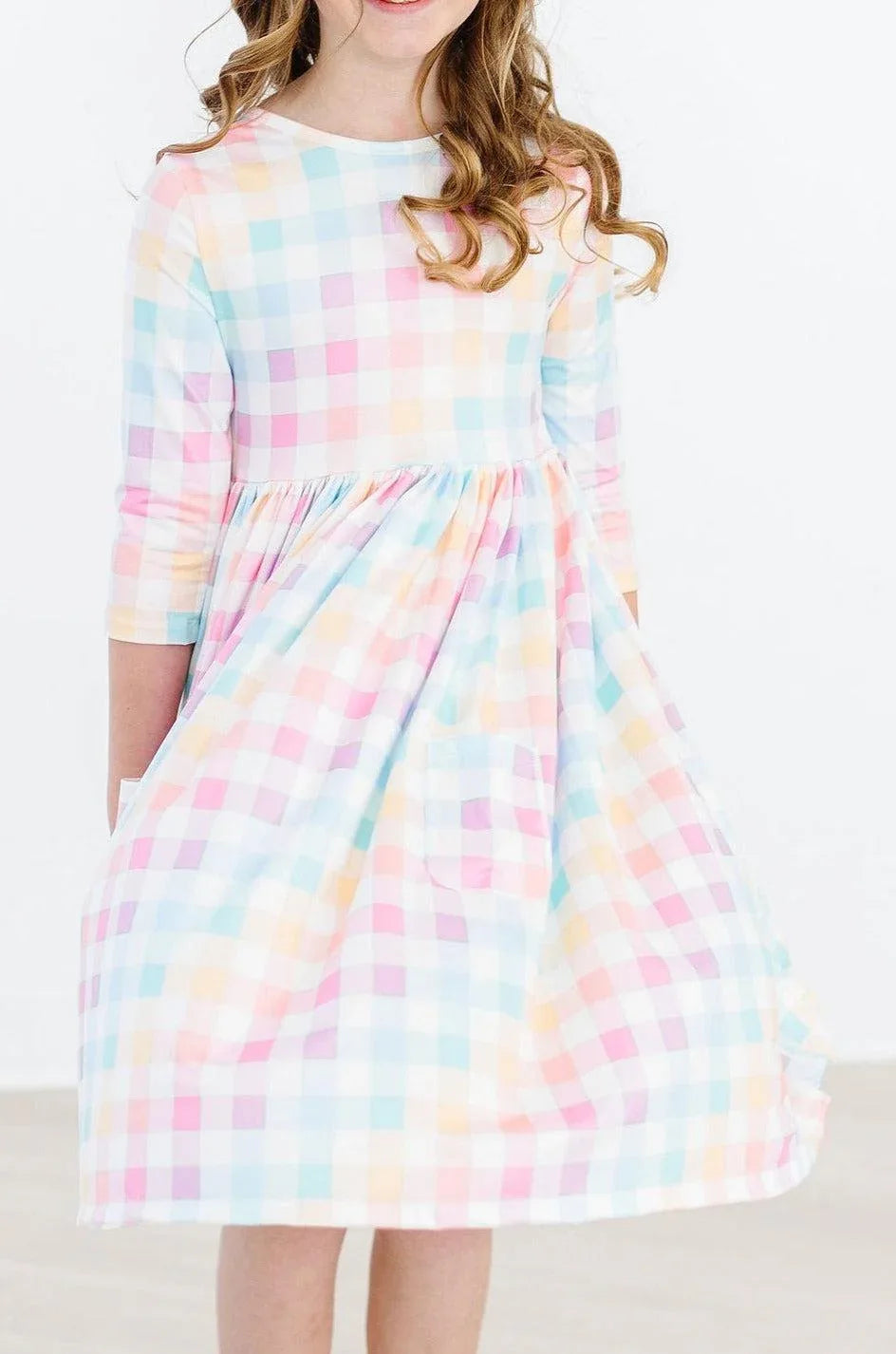 Pastel plaid girls twirl dress with 3/4 sleeves in soft multicolor for young girls