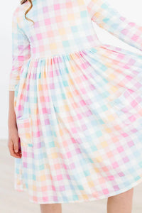 Pastel plaid girls twirl dress by Mila & Rose with 3/4 sleeves and pocket detail for kids