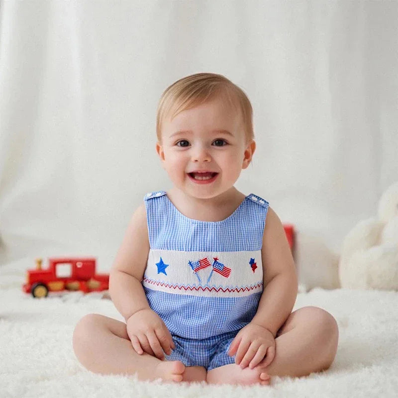 baby blue patriotic baby romper with American flag embroidery and star details for infants