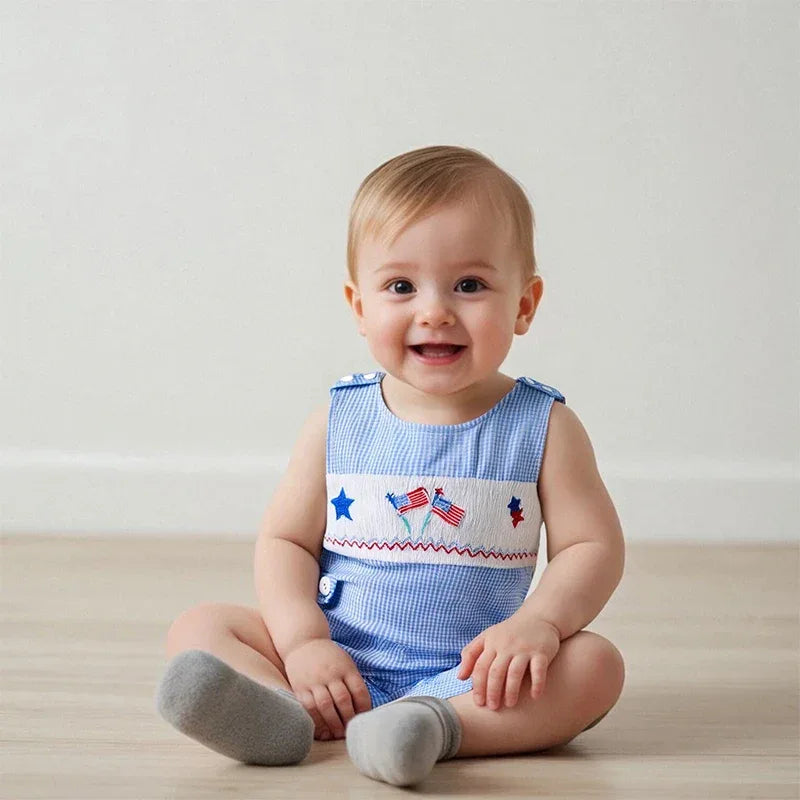 blue and white patriotic baby romper with American flag and star embroidery for infants