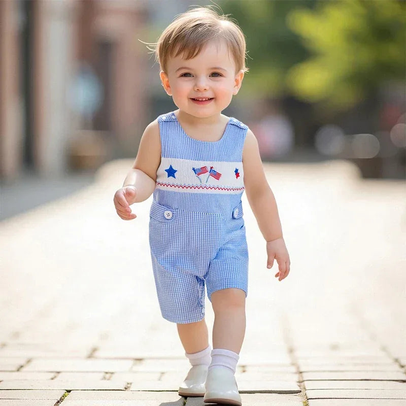 blue and white 12-month patriotic baby romper with embroidered stars and flags